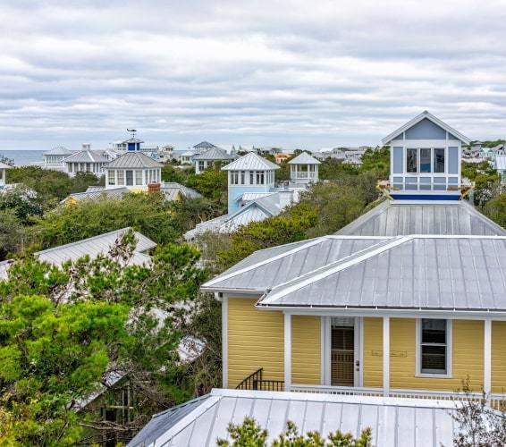 The top of houses in a beautifully gated community
