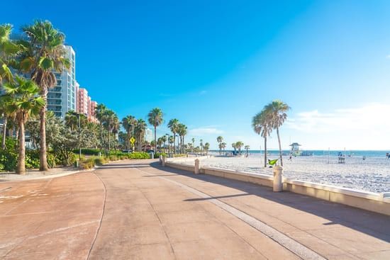 A beautiful walkway in Palm Beach, Florida along the water.